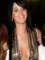 Katy perry's sweet luscious cleavage in a low cut dress in these pics