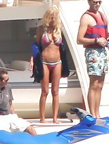 Tara Reid's ass in a skimpy bikini at a sail boat in these pics