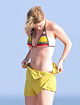 Mischa Barton on a tits exposing pictorial and seen in bikini