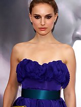 Natalie Portman looking hot in a sexy purple dress at an event in these pics