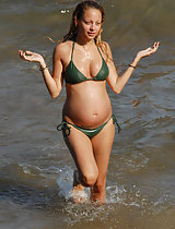 Nicole Richie pregnant and bikini-clad at the ebach in these pics